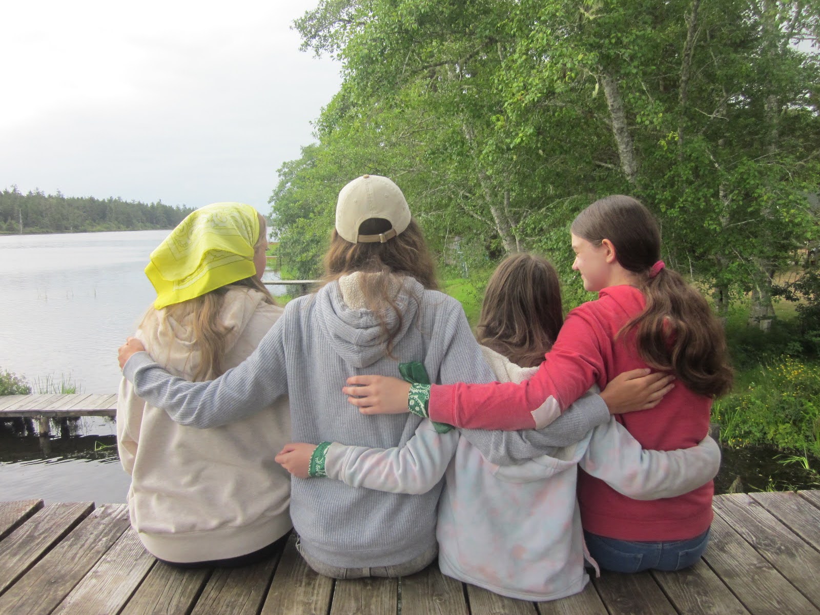Friends hanging out at the lake